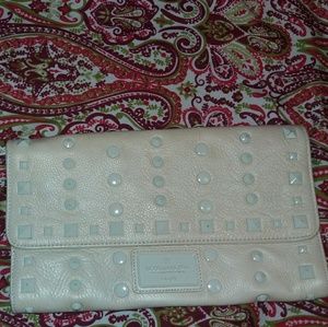 Cream studded BCBG MaxAzria leather wristlet